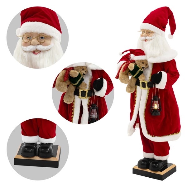 Dekorativer Weihnachtsmann mit Teddybär und Laterne