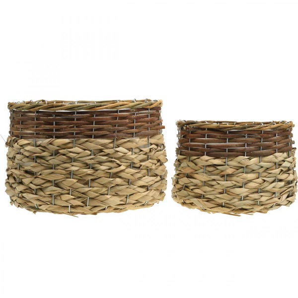 Zwei geflochtene Körbe aus Rattan und Naturmaterial