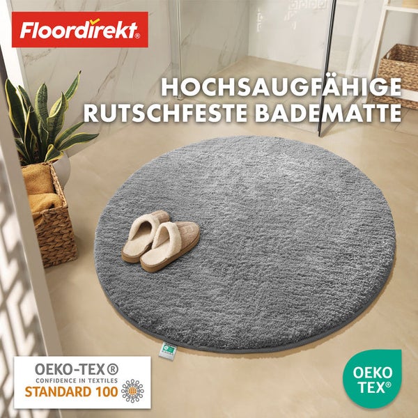 Hochflor Badematte, rutschfest, rund, mit Hausschuhen im Badezimmer