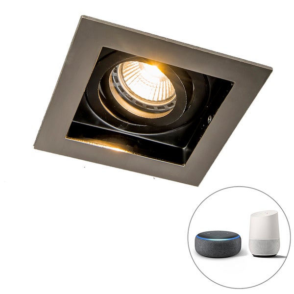 Detailaufnahme einer zylindrischen Außenleuchte aus schwarzem Metall mit Glaseinsatz und leuchtendem LED-Filament-Leuchtmittel.