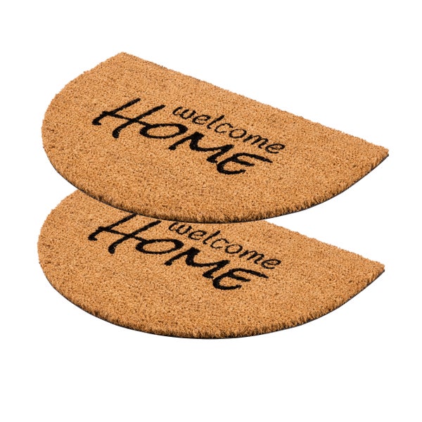 Zwei Fußmatten aus Kokosfaser mit der Aufschrift Willkommen Zuhause