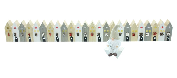 Adventskalender mit Hausmotiven und einer Zwergenfigur