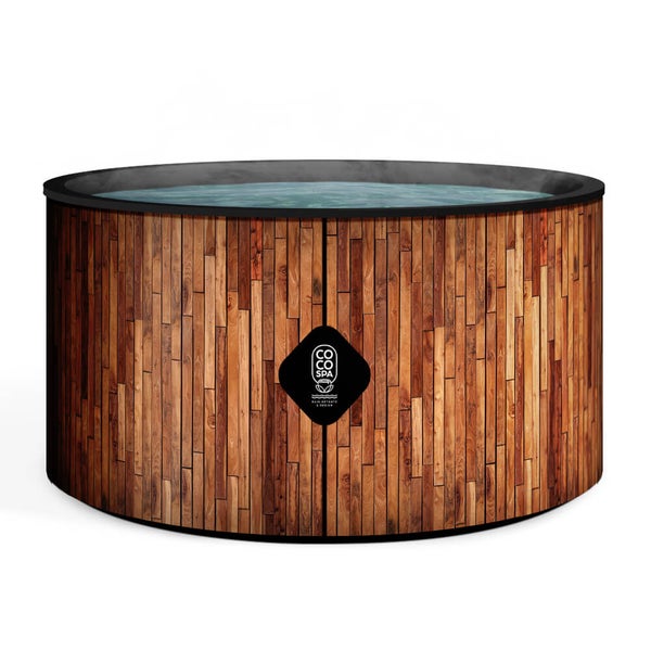 Runder Whirlpool mit Außenverkleidung in Holzoptik und COCO SPA Logo.