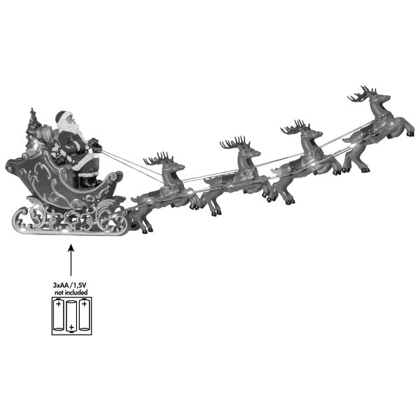 Weihnachtsdekoration mit Weihnachtsmann im Schlitten und Rentieren