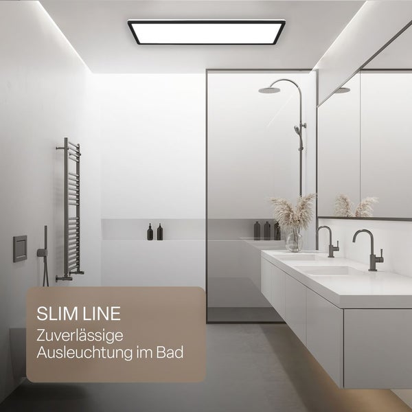 Modernes, helles Badezimmer mit einer rechteckigen LED-Deckenleuchte, Doppelwaschtisch, begehbarer Dusche und Handtuchheizkörper.