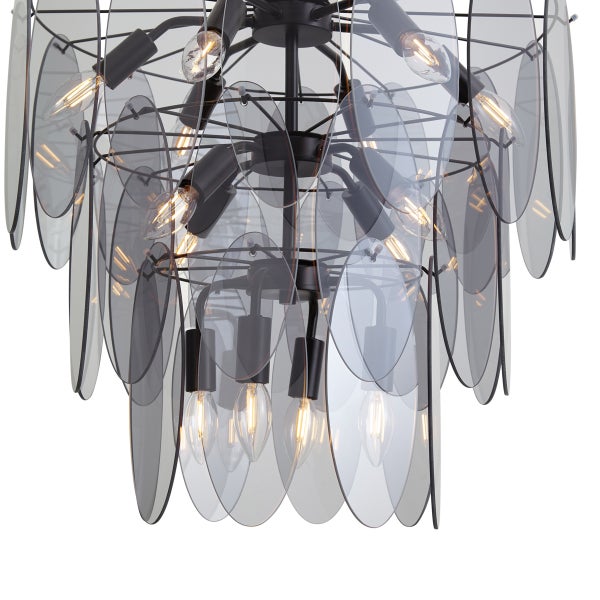 Moderne Pendelleuchte mit Metallgestell und dekorativen, hängenden Glaselementen in runder Form für eine elegante Raumbeleuchtung.