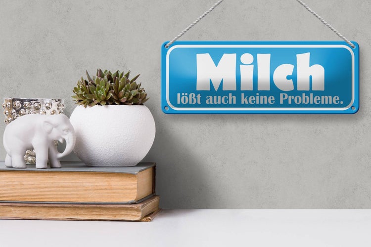 Blechschild Spruch 27x10cm Milch löst auch keine Probleme Dekoration
