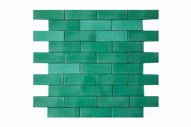 Mosaikfliese in grüner Ziegeloptik.