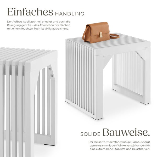 Badezimmer mit Waschbecken, Schrank, Wäschekorb und Badematte