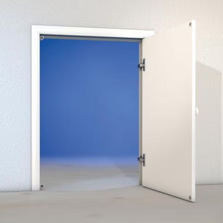Offene Revisionsklappe mit weißem Rahmen und Türblatt eingebaut in eine Wand