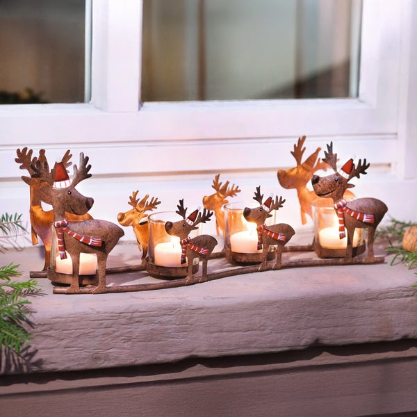 Dekoration mit Rentier-Kerzenhalter für die Weihnachtszeit