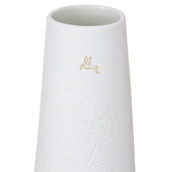 Weiße Keramikvase mit goldenem Vogel-Detail und eingearbeitetem Blumenrelief.