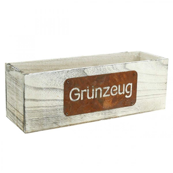Holzkiste mit der Aufschrift 'Grünzeug'