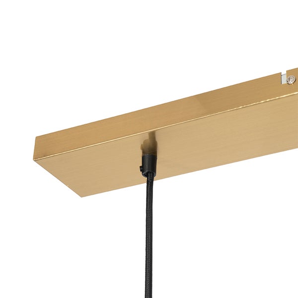 Detailaufnahme einer Deckenleuchte mit einem rechteckigen, goldfarbenen Baldachin und einem schwarzen Kabel