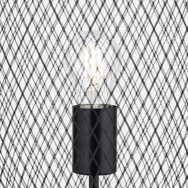 Lampe mit einer klaren Glühbirne und schwarzem Lampenschirm mit Rautenmuster