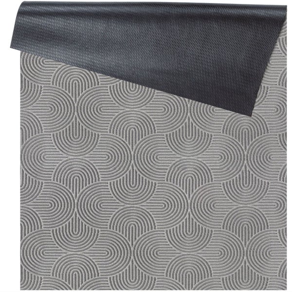 Graue Teppichmatte mit Kreisbogenmuster und schwarzer Rückseite