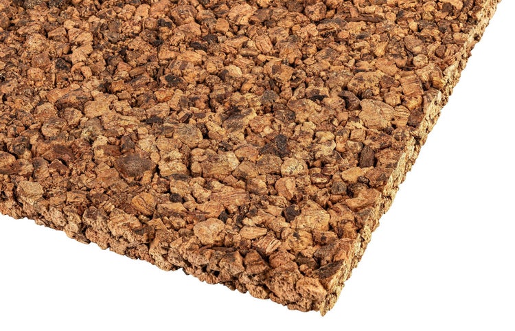 Eine Korkplatte mit grober Textur für Wand oder Boden als Dämmmaterial oder Dekorationselement.