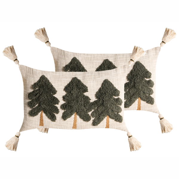 Zwei dekorative Kissen mit gestickten Tannenbaum Motiven und Quasten an den Ecken