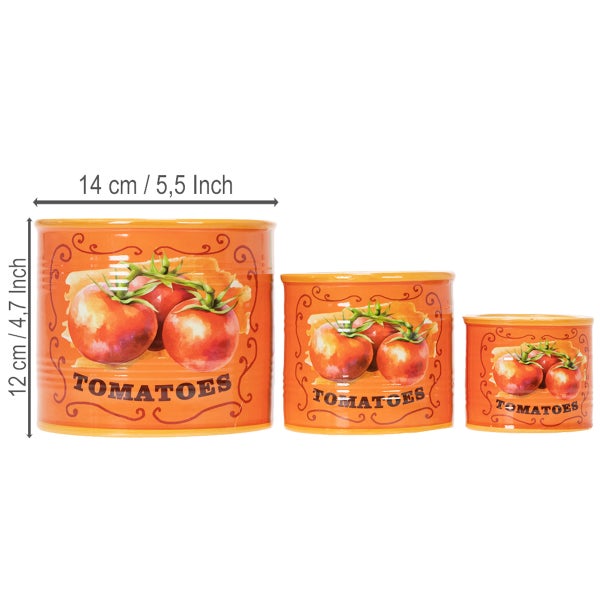 Drei dekorative Dosen mit Tomatenmotiv in verschiedenen Größen.