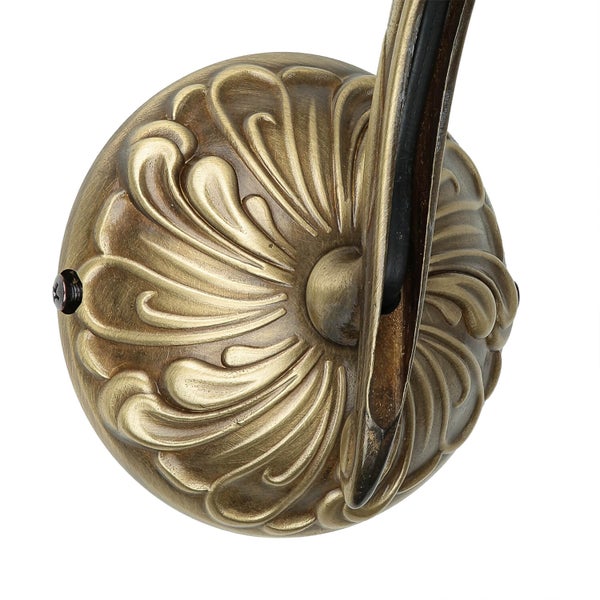 Detail einer Wandleuchte mit floralem Muster