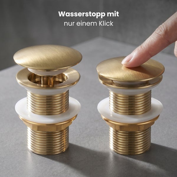 Pop-up Ablaufventil für Waschbecken in Gold-Optik, ein offenes und ein durch Fingerdruck geschlossenes Ventil.