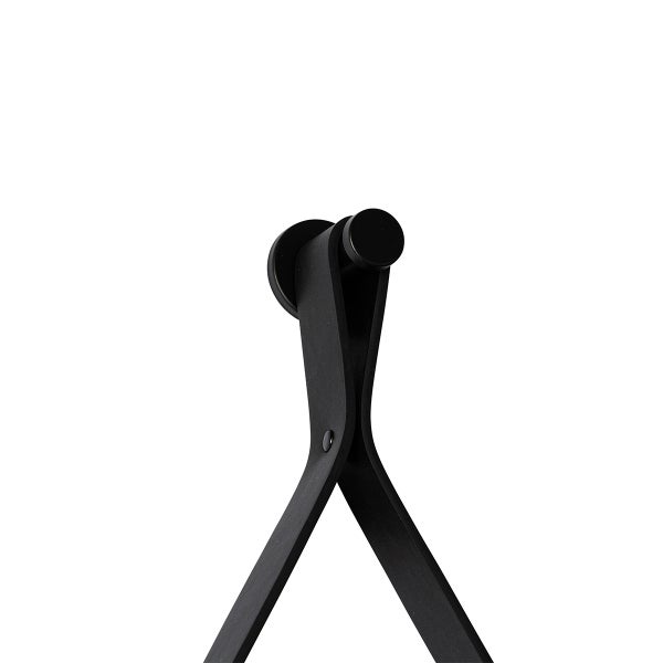 Detailansicht einer schwarzen Schiebetürbeschlag-Aufhängung.