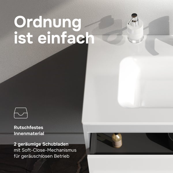 Waschplatz mit zwei Schubladen, rutschfestem Innenmaterial und Soft Close Auszug in einem modernen Badezimmer.