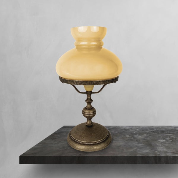 Tischleuchte mit gelbem Glasschirm