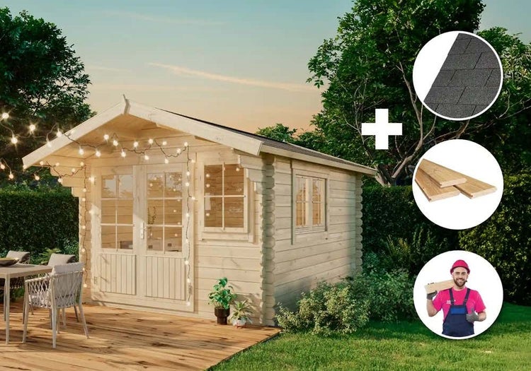 Gartenhaus mit Schindeln, Holzterrasse und Lichterkette im Garten