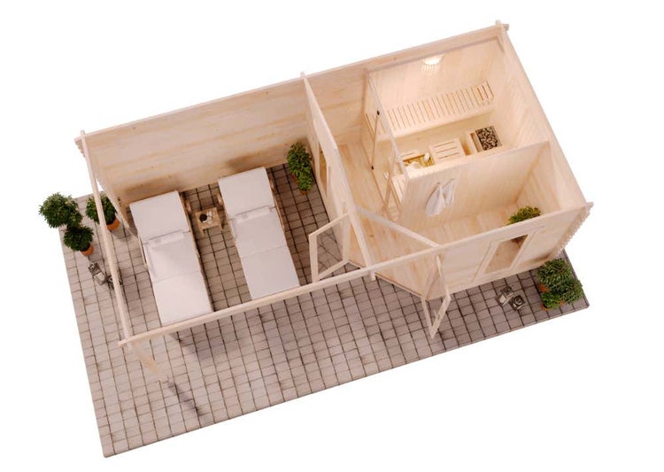 Vogelperspektive eines Gartenhauses aus Holz mit integrierter Sauna inklusive Bänken und Ofen sowie einer Terrasse mit zwei Sonnenliegen.
